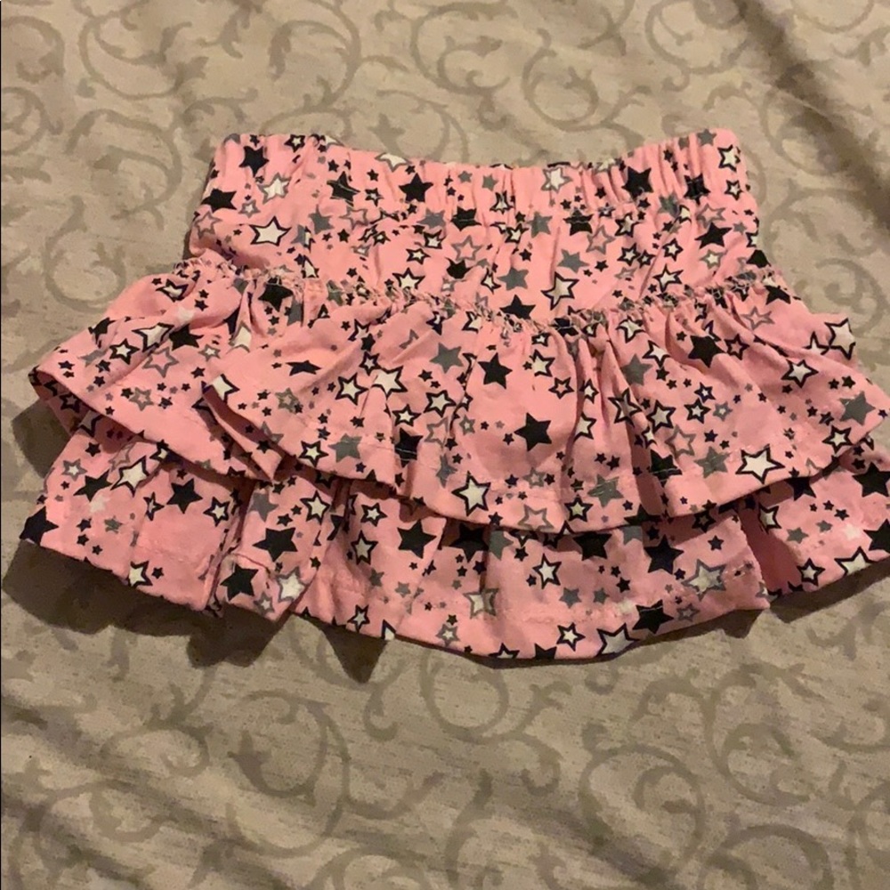 Pink skirt with black,white,and grey stars